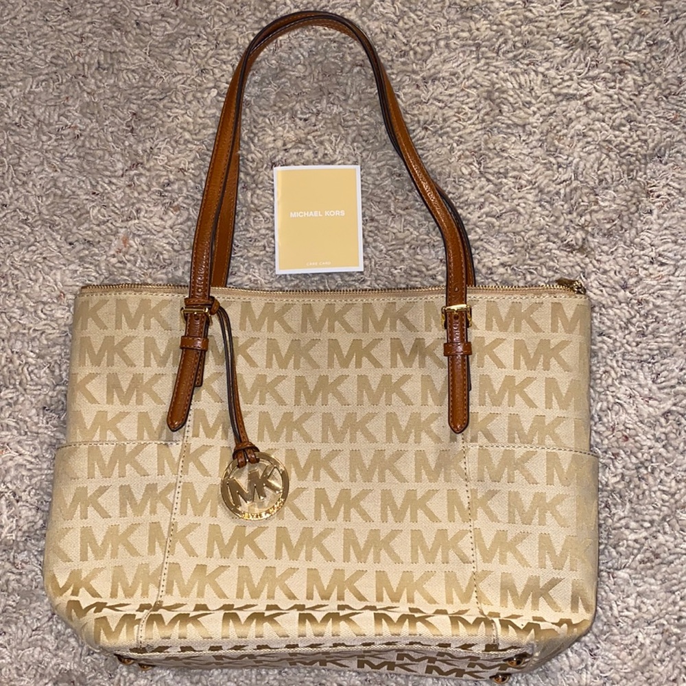 Michael Kors beige with gold accents